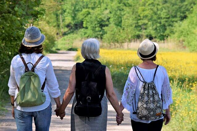 Perfect love - three ladies holding hands